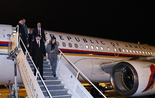 The Prime Minister arrives in Budapest on a working visit with his wife